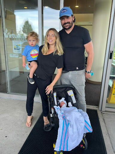 Mom Dad Baby and Big Brother Leaving the Hospital. Happy Surviving 2 Under 2.