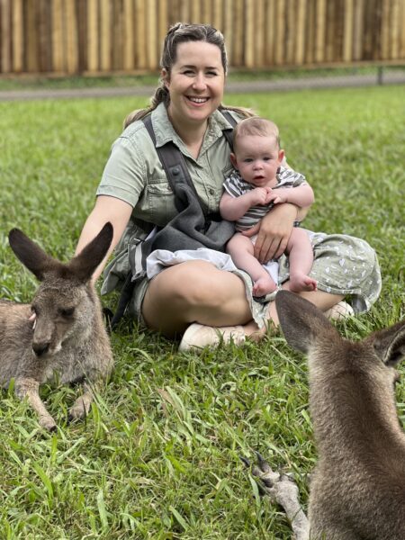 Mom holding son with a kangaroo