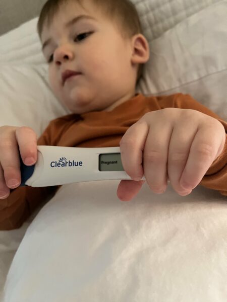 First chid holding positive pregnancy test